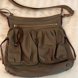 MZ Wallace crossbody or over shoulder purse. Taupe w/burgundy and gold accents
